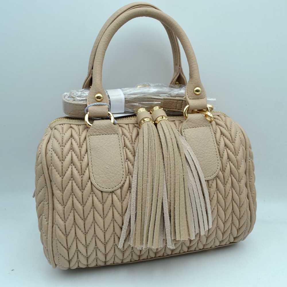 Stone Add an upscale, high-texture statement to your accessory collection with this beautifully crafted structured satchel bag. Combining a sophisticated, textured body with playful design accents, this handbag brings a perfect blend of modern elegance and day-to-night versatility to any outfit.