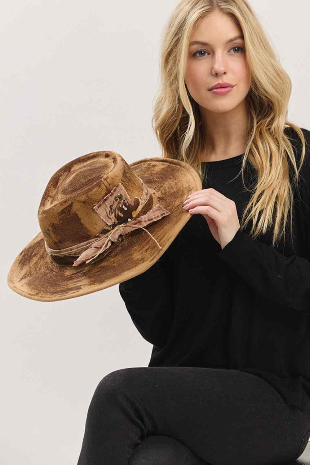 Taupe Two iconic looks, one hat! This Cowboy Hat's flexible brim allows for effortless shaping, letting you wear it as a classic cowboy hat or style it as a contemporary fedora.