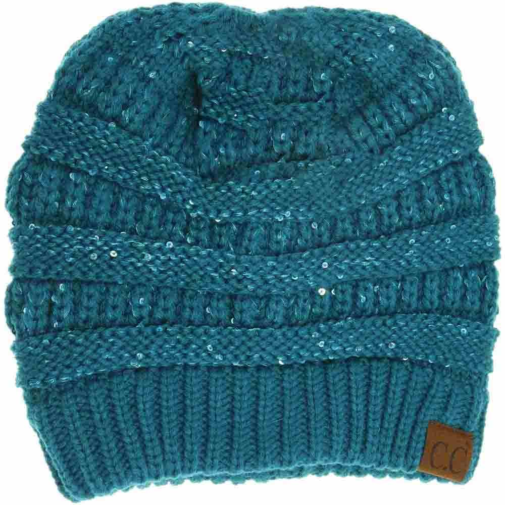 Teal Sequin CC Tail Beanie expertly blends functionality with fashionable detail. Crafted from soft, insulating materials, it ensures warmth during colder seasons. The subtle sequin embellishments add a refined shimmer without overwhelming the design, while the distinctive tail silhouette offers a contemporary edge. Perfect for those seeking sophisticated winter headwear that performs as well as it looks.