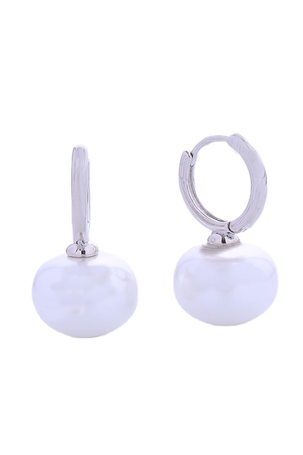 White Gold Elegant dangling pearl huggie earrings crafted with 14K gold and white gold dipping over brass. Each earring measures 1.7cm and features lustrous pearls for a timeless, sophisticated look. Hypoallergenic design ensures comfort for sensitive ears. Lead and nickel compliant for safety and peace of mind. Expertly made in Korea with attention to quality craftsmanship. Perfect for everyday wear or special occasions.