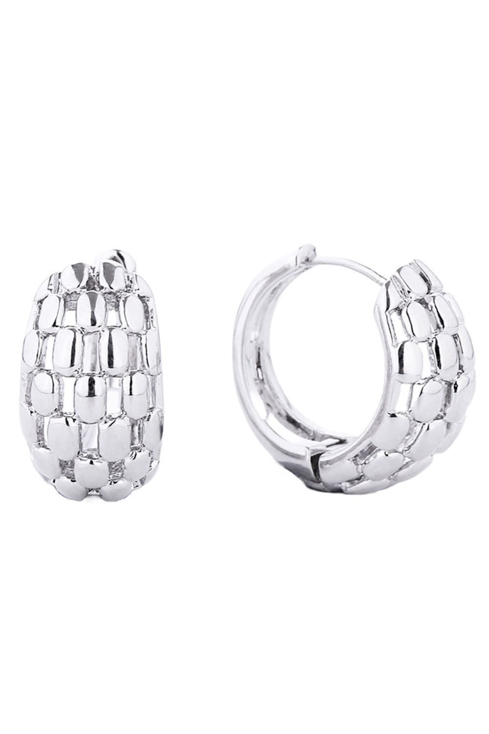 White Gold Delicate 14K gold and white gold dipped huggie hoops crafted from hypoallergenic brass. These petite hoops feature a 2.11cm diameter, perfect for a subtle everyday look. Lead and nickel compliant for sensitive skin. Lightweight, versatile, and designed to hug the earlobe with effortless elegance.