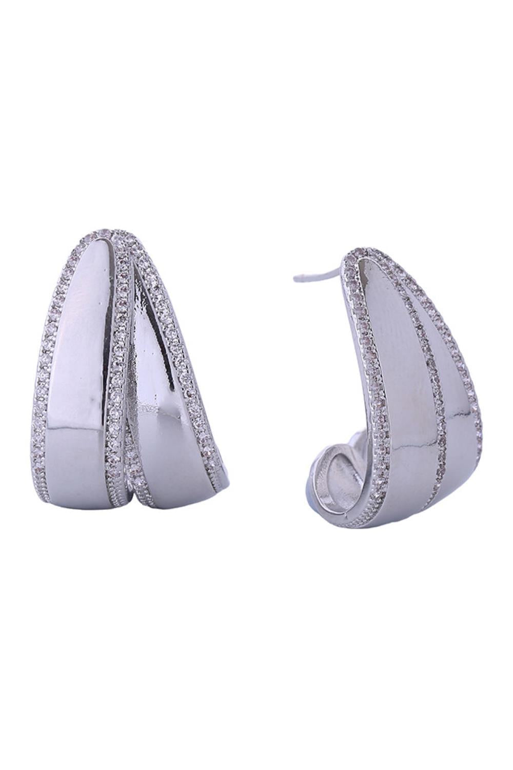 White Gold Elegant double layer C hoop earrings crafted with 14K gold and white gold dipping over brass. Adorned with sparkling cubic zirconia accents for timeless sophistication. Measuring 2.7cm, these hypoallergenic earrings are perfect for sensitive skin. Lead and nickel compliant for safe, worry-free wear. Expertly made in Korea with quality craftsmanship you can trust.