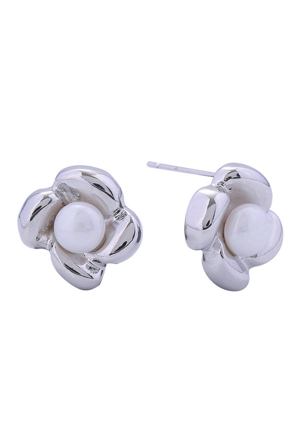 White Delicate flower-shaped post earrings featuring lustrous pearls with 14K gold and white dipping. Crafted from hypoallergenic brass, these studs are gentle on sensitive ears and compliant with lead and nickel regulations. Each earring measures 1.5cm in diameter, offering an elegant everyday look. Perfect for adding a touch of timeless sophistication to any outfit.