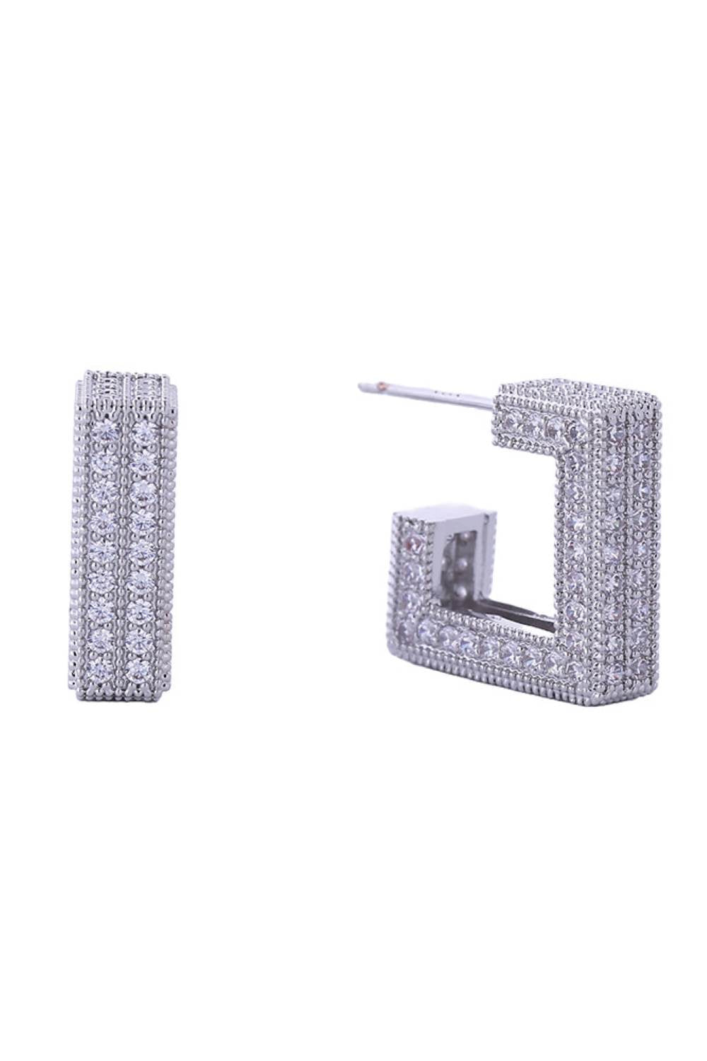White Gold Elevate your everyday look with these stunning 14K Gold/White Gold dipped geometric post earrings. Crafted from hypoallergenic brass and adorned with sparkling cubic zirconia pavé detailing, these 1.8cm studs offer timeless elegance with a modern edge. Perfect for sensitive ears, they're lead and nickel compliant for worry-free wear. Expertly made in Korea, these versatile earrings transition seamlessly from day to night, adding a touch of sophistication to any outfit.