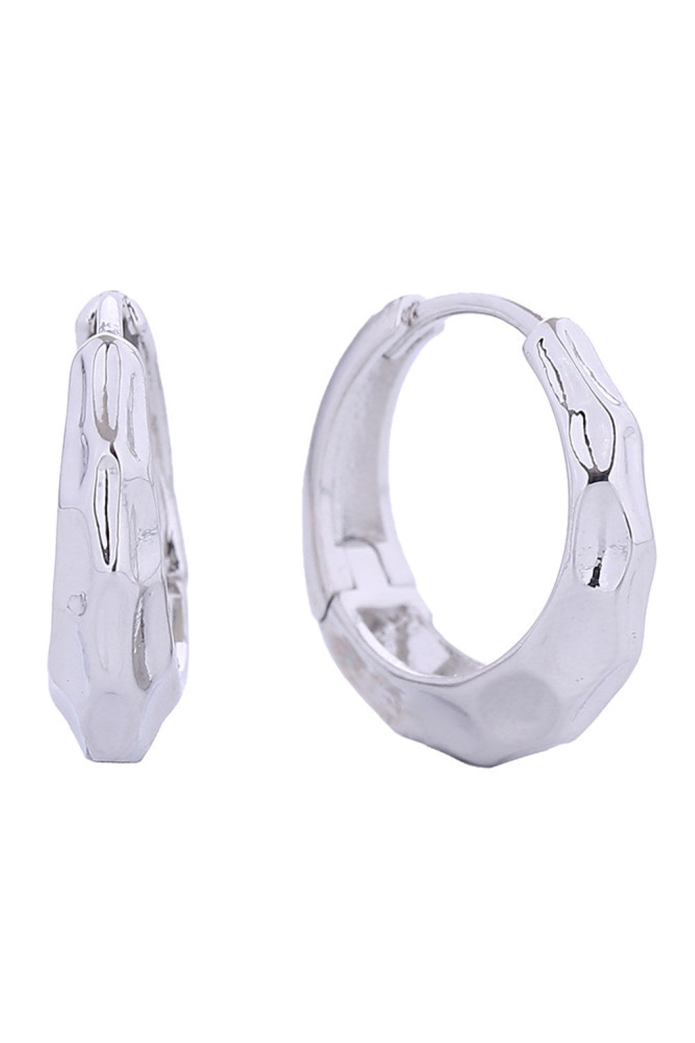 White Gold Delicate yet striking, these 14K gold and white gold dipped hammered hoop huggie earrings offer timeless elegance in a compact 1.8cm size. Crafted from hypoallergenic brass, they're perfect for sensitive ears and comply with lead and nickel safety standards. The textured hammered finish adds dimension and sophistication to any look. Made in Korea with quality craftsmanship, these versatile huggie earrings transition seamlessly from everyday wear to special occasions.