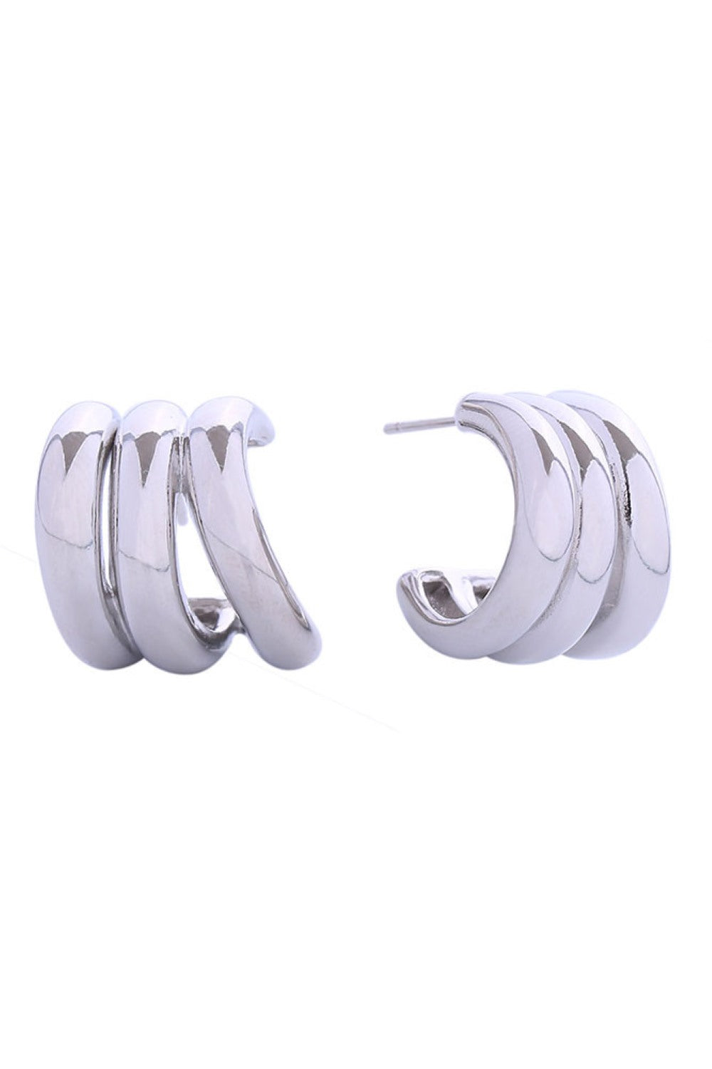 White Gold Delicate triple hoop post earrings crafted in brass with 14K gold and white gold dipping. These petite 2cm earrings feature a hypoallergenic design, making them perfect for sensitive ears. Lead and nickel compliant for safe, everyday wear. Expertly made in Korea, these versatile studs add understated elegance to any look.