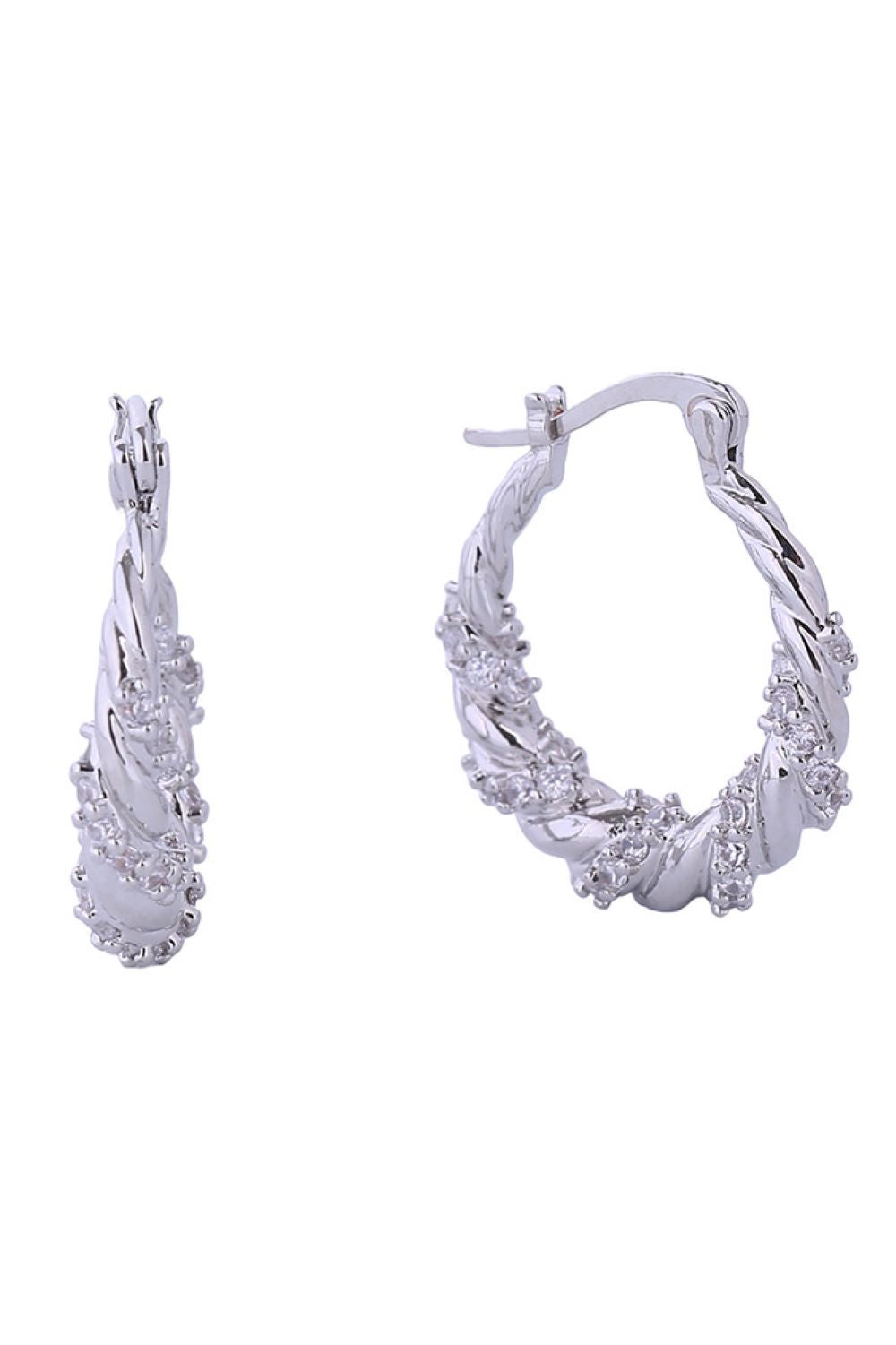 White Gold Elevate your everyday look with these stunning 14K Gold/White Gold Dipped Twisted Rope Pincatch Earrings. Crafted from quality brass and adorned with sparkling cubic zirconia, these petite 2.2cm earrings deliver maximum elegance in a minimalist design. Hypoallergenic and lead and nickel compliant, they're perfect for sensitive ears. The twisted rope detailing adds texture and dimension, while the secure pincatch closure keeps them safely in place throughout your day.