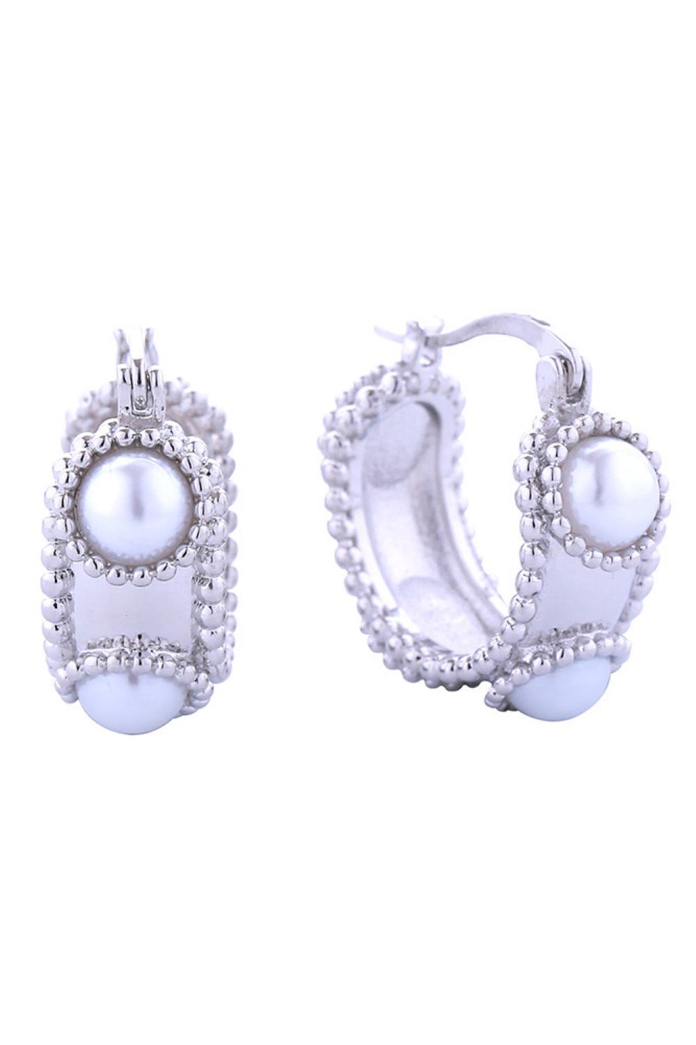 White Gold Elevate your jewelry collection with these 14K Vintage Pearl Pincatch Earrings, where classic charm meets contemporary comfort. Each earring features a lustrous pearl set in gold and white dipped brass, measuring 2.3cm in diameter for a refined, understated presence. Hypoallergenic construction protects sensitive skin, while Lead and Nickel Compliant certification guarantees safety and peace of mind. The vintage-inspired design transitions seamlessly from casual to formal settings, making these e