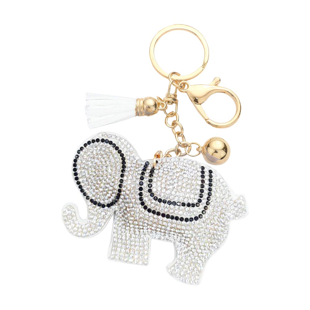 White Bling Elephant Tassel Bag Charm adds a touch of luxurious charm to any bag or accessory. With its intricate design and sparkling details, this charm will make a statement while also adding a touch of fun to your style. A must-have for any fashionista.