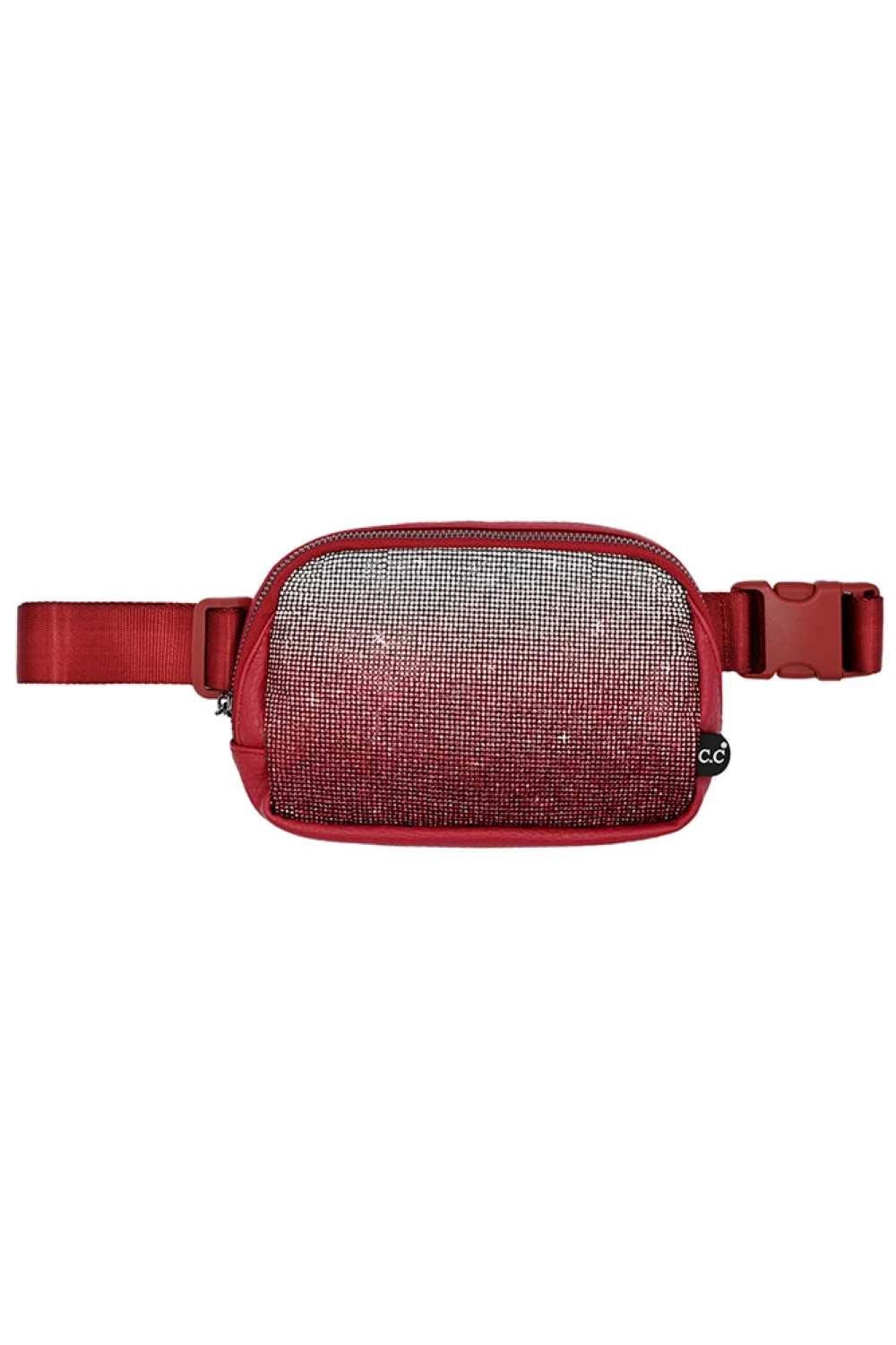 Wine Elevate your accessory game with the C.C Ombre Rhinestone Fanny Pack. This eye-catching piece features a stunning ombre design adorned with sparkling rhinestones that catch the light beautifully. Crafted from a durable blend of 50% PU and 50% polyester, it's built to last through all your adventures. With compact dimensions of 8.75" x 6" x 2", this fanny pack offers practical storage without the bulk.