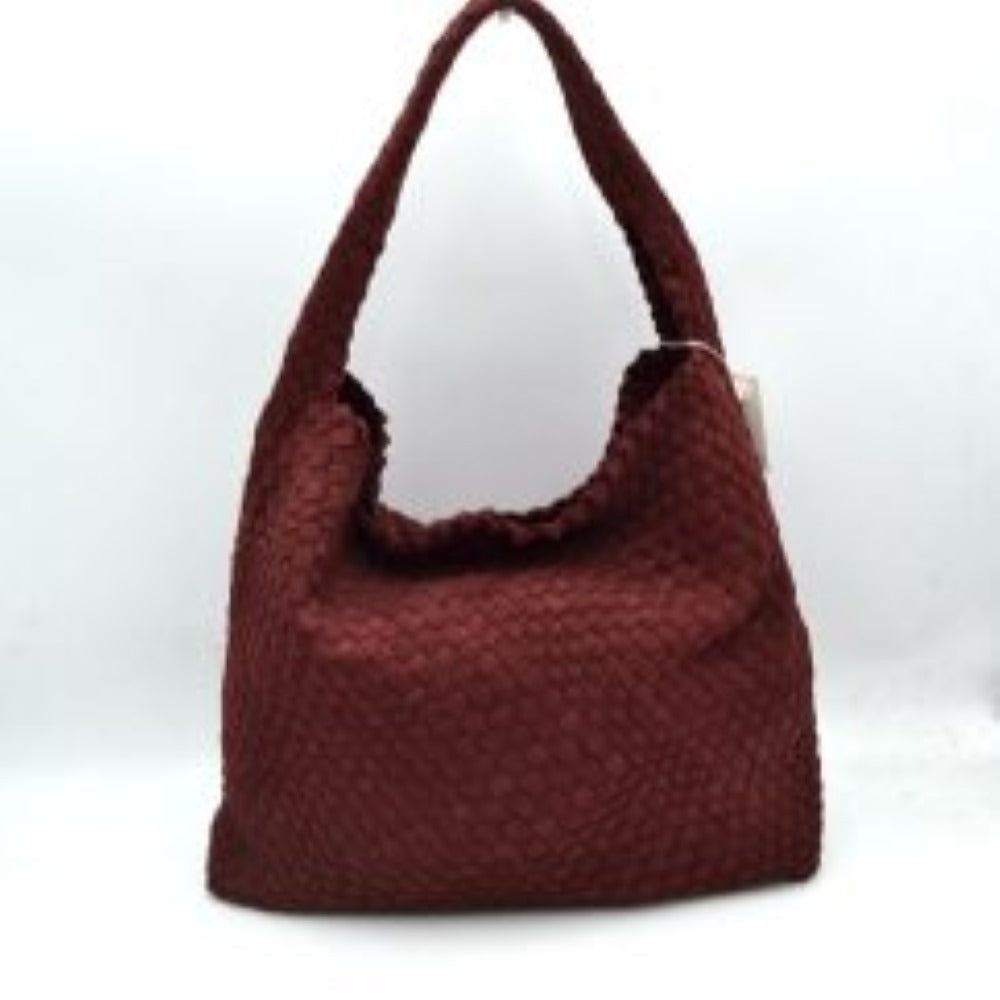 Wine This relaxed, slouchy shoulder bag showcases a beautifully textured, fully woven exterior in a classic checkerboard style. It is designed with a spacious, scooped hobo silhouette that naturally molds to the body for comfortable daily wear. The wide, integrated shoulder strap extends seamlessly from the side panels, ensuring durable carrying capacity while maintaining a clean, hardware-free aesthetic suitable for both casual and smart-casual ensembles.
