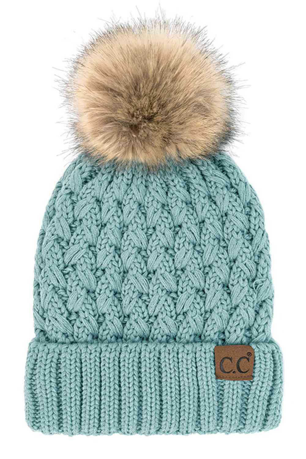 Mint Elevate your winter wardrobe with the C.C Lattice Crossover Stitch Beanie, featuring an intricate lattice pattern and cozy pom detail. Crafted from 100% soft acrylic, this beanie delivers warmth and comfort without the weight. The crossover stitch design adds visual interest while the relaxed fit suits most face shapes. Perfect for layering over your favorite winter looks, this versatile beanie transitions effortlessly from casual outings to outdoor adventures. One size fits most for easy, everyday wea