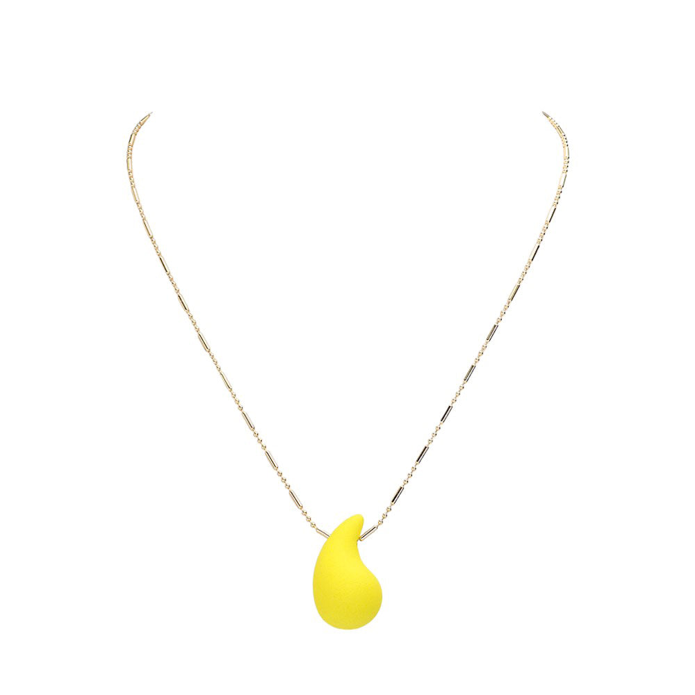 Yellow stunning Matte Colored Teardrop Pendant Necklace is a must-have for any fashion-forward individual. Its matte finish adds a touch of sophistication, while the teardrop shape provides a delicate and feminine touch. Elevate any outfit with this stylish and versatile piece.