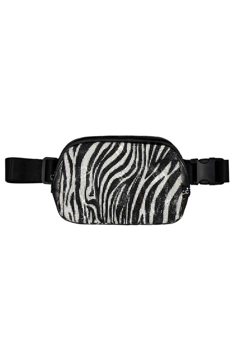 Zebra Elevate your everyday carry with this eye-catching C.C Animal Print Rhinestone Crossbody Fanny Pack. Featuring a bold animal print design adorned with sparkling rhinestones, this compact pack combines style with functionality. The durable 50% PU and 50% polyester blend ensures lasting wear, while the crossbody strap keeps your essentials secure and hands-free. Perfect for festivals, travel, or casual outings, this 8.75" x 6" x 2" pack offers just enough space for your phone, keys, and small accessorie