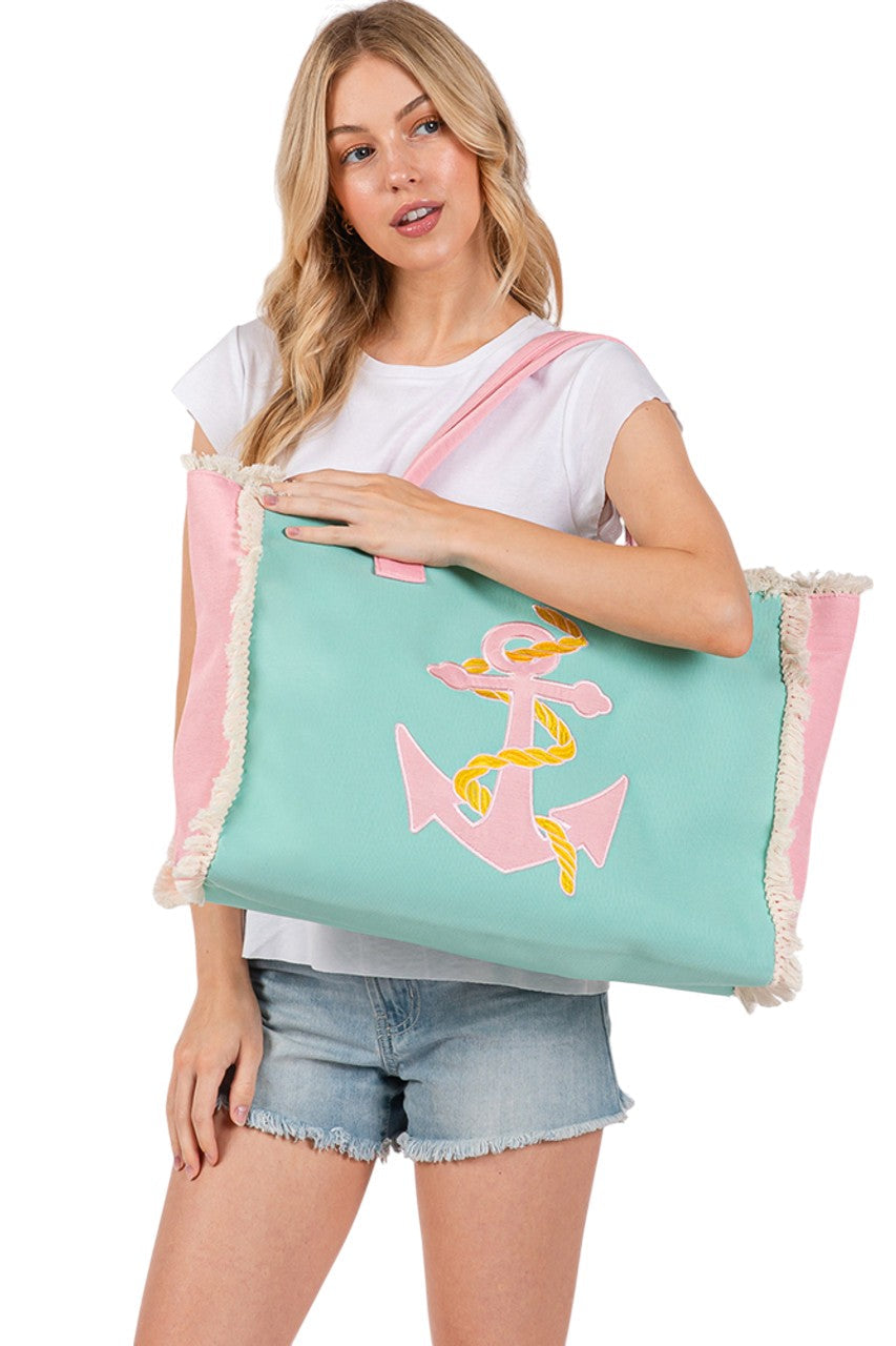 Pink Anchor Embroidered Design Patch Summer Tote Bag combines durability with style, featuring a detailed anchor embroidery that adds a nautical touch. Crafted for summer use, its spacious interior accommodates essentials for beach days or casual outings. The sturdy handles ensure comfortable carrying, making it a practical and fashionable accessory for warm-weather adventures.