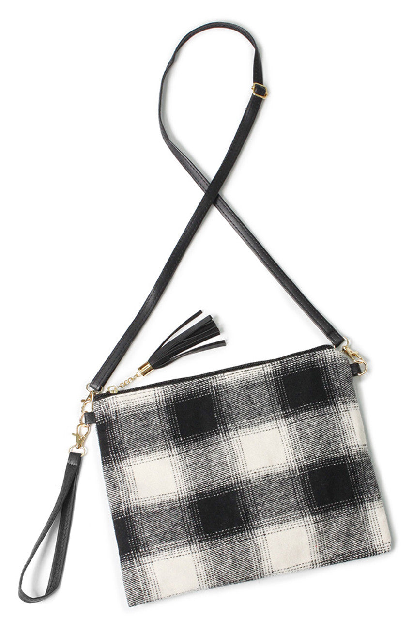 Buffalo Check Pattern Crossbody Bag combines timeless style with practical design. Crafted with a classic buffalo check pattern, this bag offers a versatile accessory that complements various outfits. Its crossbody strap ensures comfortable, hands-free wear, making it ideal for daily errands or casual outings. Durable materials and thoughtful construction provide lasting quality, while the compact size keeps essentials organized without bulk. Perfect for those seeking a blend of fashion and function in one
