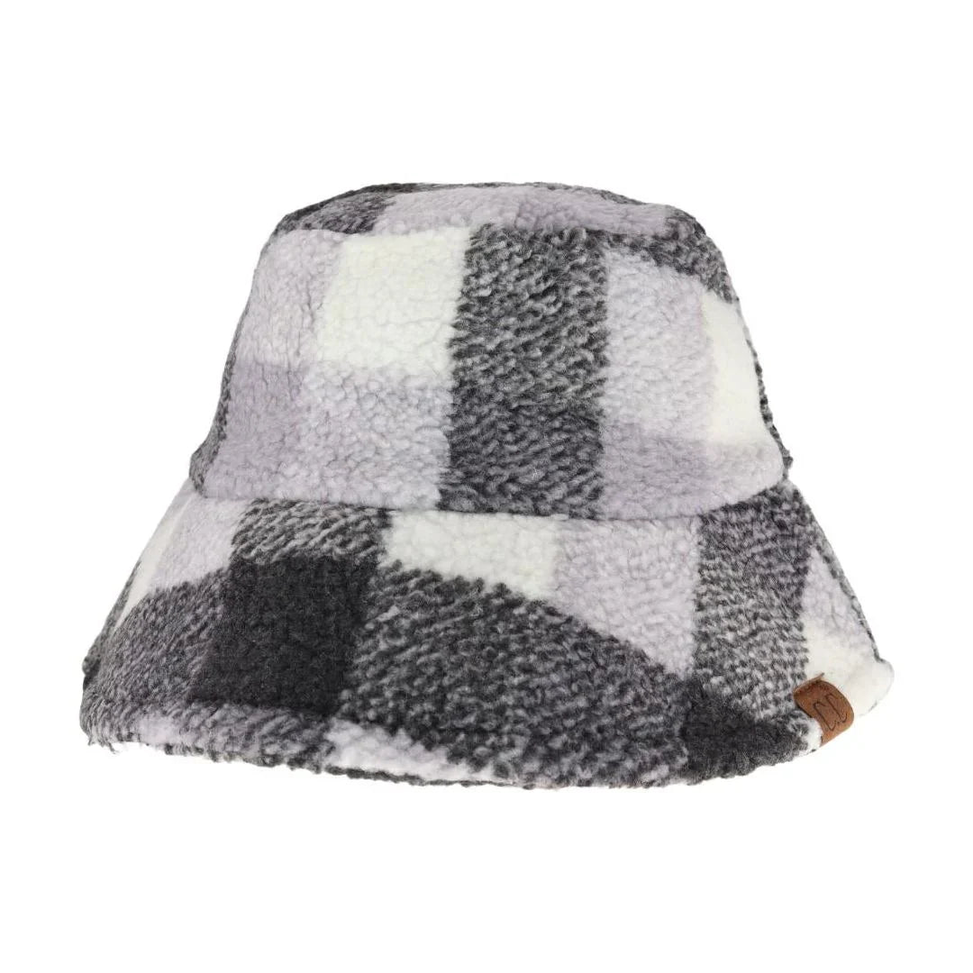 Gray Black Buffalo Check Sherpa C.C Bucket Hat combines classic buffalo check patterning with cozy sherpa lining for superior warmth and style. Designed for cold weather, this bucket hat offers a comfortable fit and soft texture, making it an ideal accessory for outdoor activities or casual wear. Its durable construction ensures lasting use, while the timeless design adds a refined touch to any winter outfit.