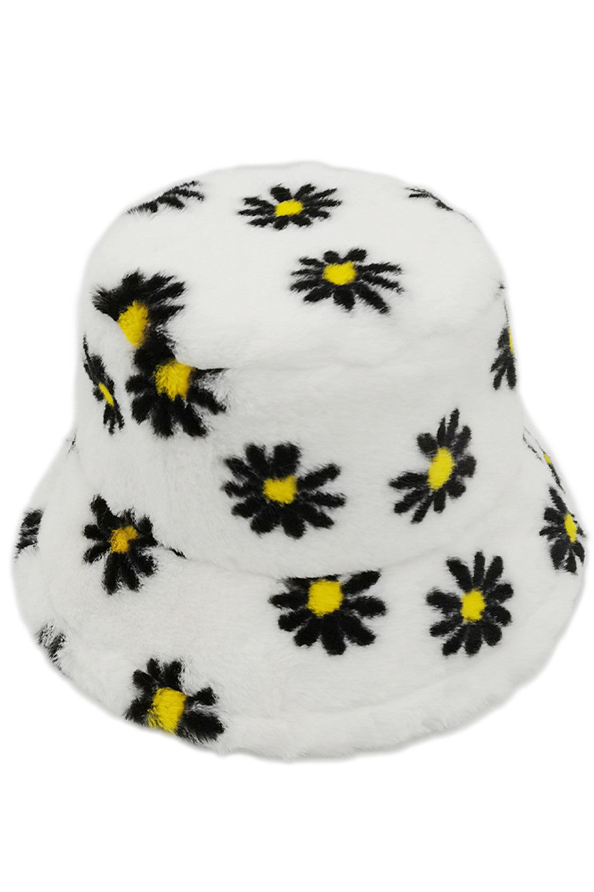 White Floral Faux Fur Bucket Hat combines luxurious texture with contemporary design. Crafted with premium faux fur, it features subtle floral embellishments that elevate its aesthetic appeal. The structured bucket silhouette provides optimal face framing while delivering superior warmth retention. Ideal for fashion-forward individuals seeking both functionality and sophisticated style in cold-weather accessories.