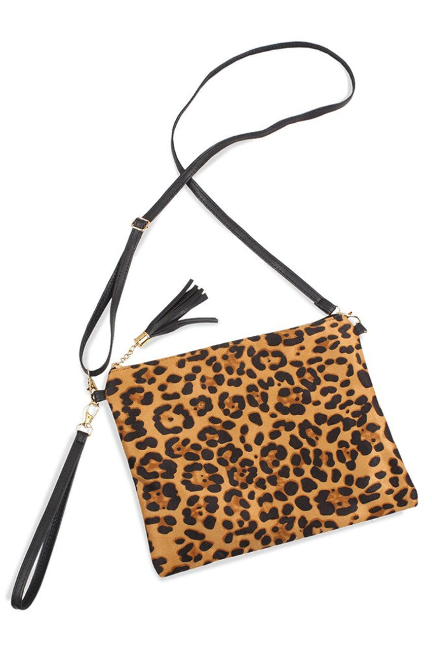 Leopard Crossbody Clutch Bag offers a sophisticated blend of bold design and practical functionality. Featuring a distinctive leopard print, this clutch is crafted to elevate your ensemble with a touch of wild elegance. Its streamlined silhouette provides ample space for essentials, while the adjustable crossbody strap ensures comfortable, hands-free wear. Ideal for both casual outings and evening events, this bag combines expert craftsmanship with versatile style.