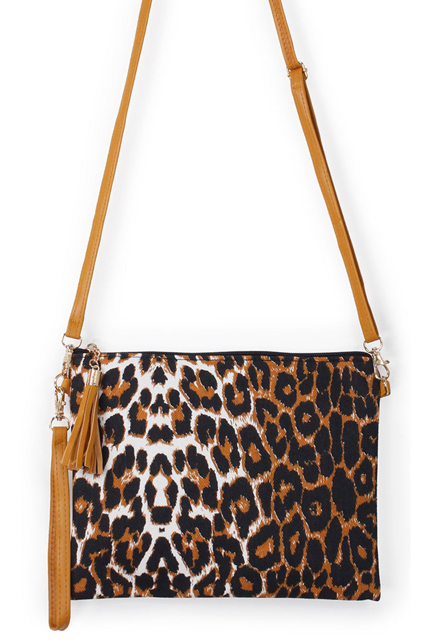 Leopard Print Crossbody Clutch Bag combines bold style with practical design. Featuring a distinctive leopard pattern, it adds a fashionable edge to any outfit. The crossbody strap offers hands-free convenience, while its compact size is perfect for carrying essentials securely. Crafted with attention to detail, this clutch balances durability and elegance, making it a smart choice for both casual and evening occasions.