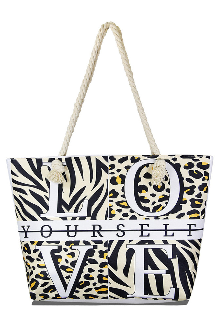 Love Yourself Animal Print Beach Bag combines stylish design with practical functionality. Crafted from durable materials, it offers ample space for all your beach essentials while its eye-catching animal print adds a fashionable touch. Lightweight and easy to carry, this bag is perfect for those who want to stay organized and make a statement by the shore.