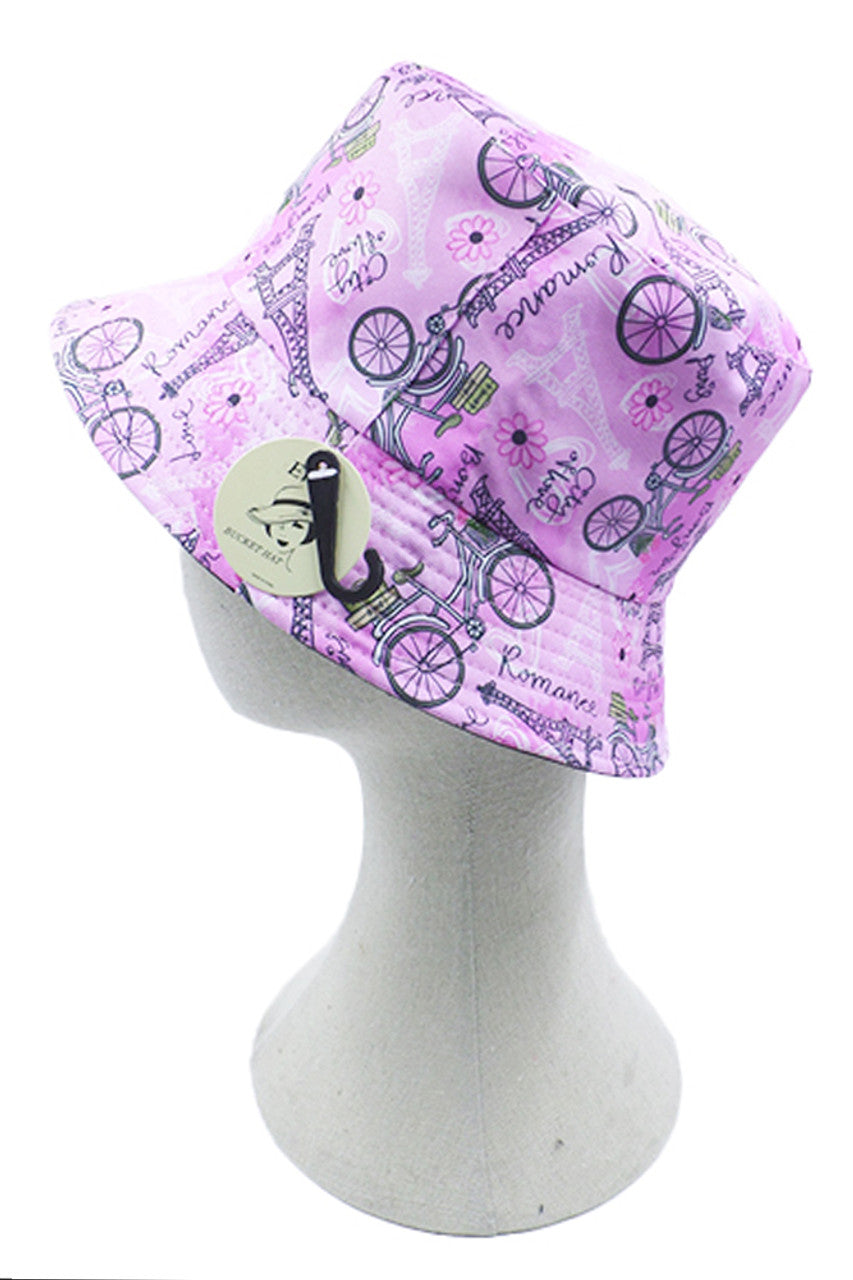 Purple Paris Theme Print Bucket Hat showcases authentic Parisian imagery on premium fabric. The structured design maintains shape while providing optimal sun coverage. Engineered with reinforced stitching for durability and an adjustable fit. Perfect for fashion-forward individuals seeking a statement accessory with practical benefits. Pairs effortlessly with casual attire while adding sophisticated European flair.