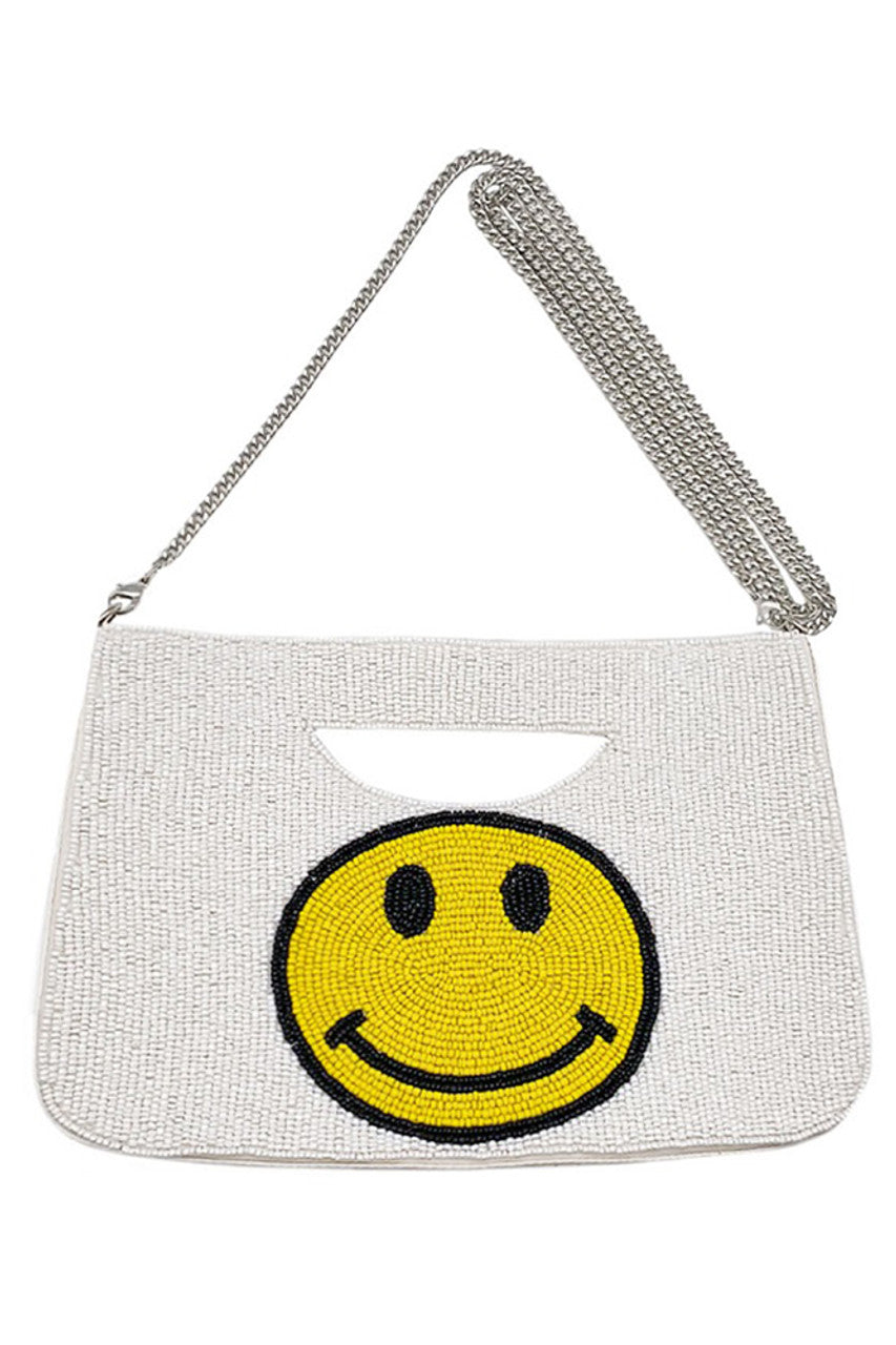 Smile Face Glass Beads Clutch combines playful design with expert craftsmanship. Featuring meticulously arranged glass beads that form a cheerful, smiley face, this clutch adds a distinctive touch to any outfit. Its compact size offers convenient portability while securely holding essentials, making it ideal for both casual outings and special occasions. Crafted with attention to detail, this accessory balances style and function for those seeking a unique statement piece.