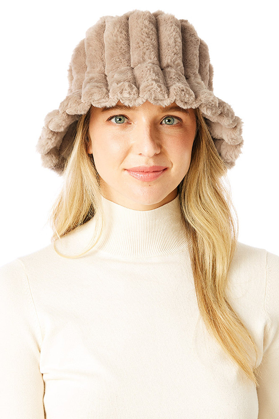Taupe SOLID SOFT FAUX FUR BUCKET HAT is designed to keep you warm and stylish. Crafted from ultra-soft faux fur, it offers a plush feel and a trendy silhouette. The classic bucket shape ensures a comfortable fit while adding texture to your outfit. A go-to choice for chilly weather, it blends fashion and function effortlessly.