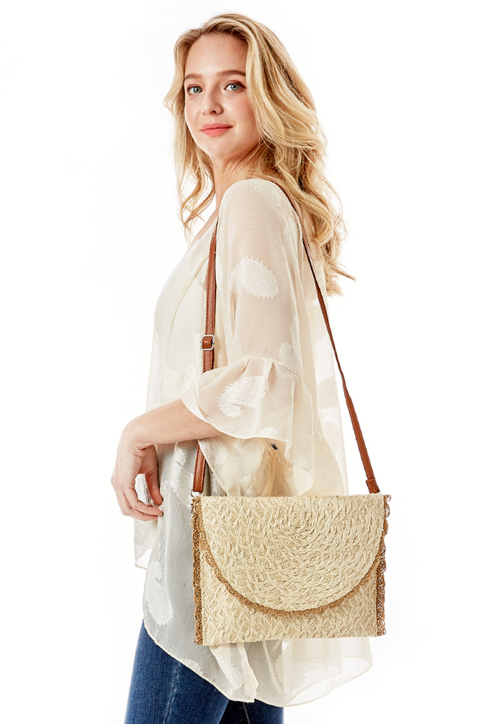 Textured Envelope Clutch Crossbody Bag offers a sophisticated blend of style and functionality. Featuring a refined, textured surface and a sleek, envelope-like silhouette, this bag provides secure storage for your essentials while maintaining a polished appearance. The adjustable crossbody strap allows for comfortable, hands-free wear, making it an ideal accessory for both professional settings and social occasions. Designed for those who appreciate elegance with a practical touch.