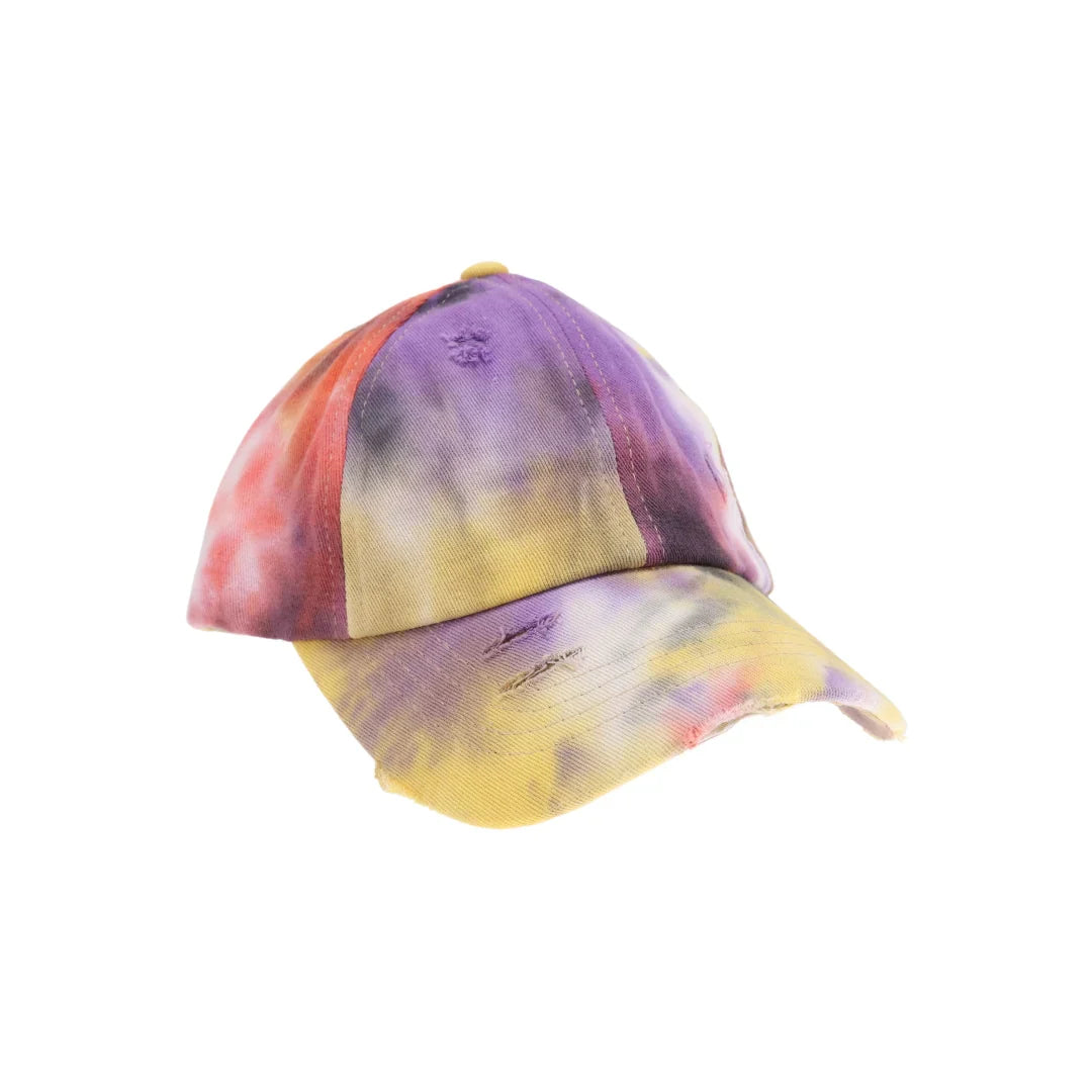 Tie Dye Criss-Cross High Ponytail CC Ball Cap offers a stylish solution for those who want to keep their hair up while staying protected from the sun. Featuring a criss-cross design at the back, it comfortably accommodates high ponytails without compromising fit. The vibrant tie-dye pattern adds a fashionable edge, making it ideal for active lifestyles or casual wear. Crafted for durability and comfort, this cap is adjustable to ensure a secure fit throughout your day.