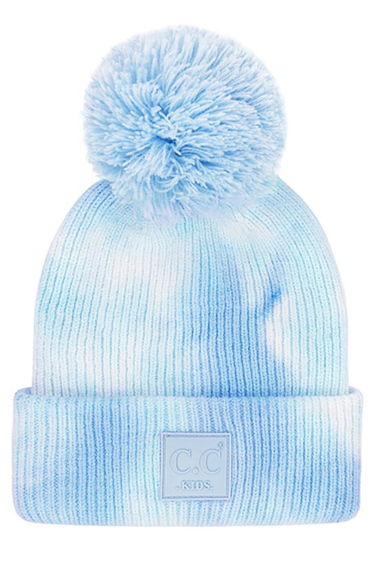 Baby Blue White C C Tie Dye Kids Beanie With C C Rubber Patch And Yarn Pom, beautiful tie dye design with yarn pom makes it unique and keeps you standing out with perfect beauty. Wear throughout the winter and cold days to ensure absolute comfortability. Coordinate with any outfit to match the best with perfect warmth and coziness. It Comes in one size winter cap with a pom that fits most head sizes. Enjoy the winter in comfort!