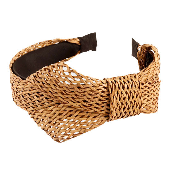 Beige Braided Bow Headband. These bow headband will make you feel extra glamorous. Push back your hair with this Bow headband, spice up any plain outfit! Be ready to receive compliments. Be the ultimate trendsetter wearing this chic headband with all your stylish outfits! Exquisite enough to use on your wedding day.