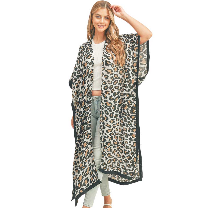 Beige Leopard Patterned Cover Up Kimono Poncho, this timeless leopard patterned kimono Poncho is soft, lightweight, and breathable fabric, close to the skin, and comfortable to wear. Sophisticated, flattering, and cozy. look perfectly breezy and laid-back as you head to the beach. A fashionable eye-catcher will quickly become one of your favorite accessories.