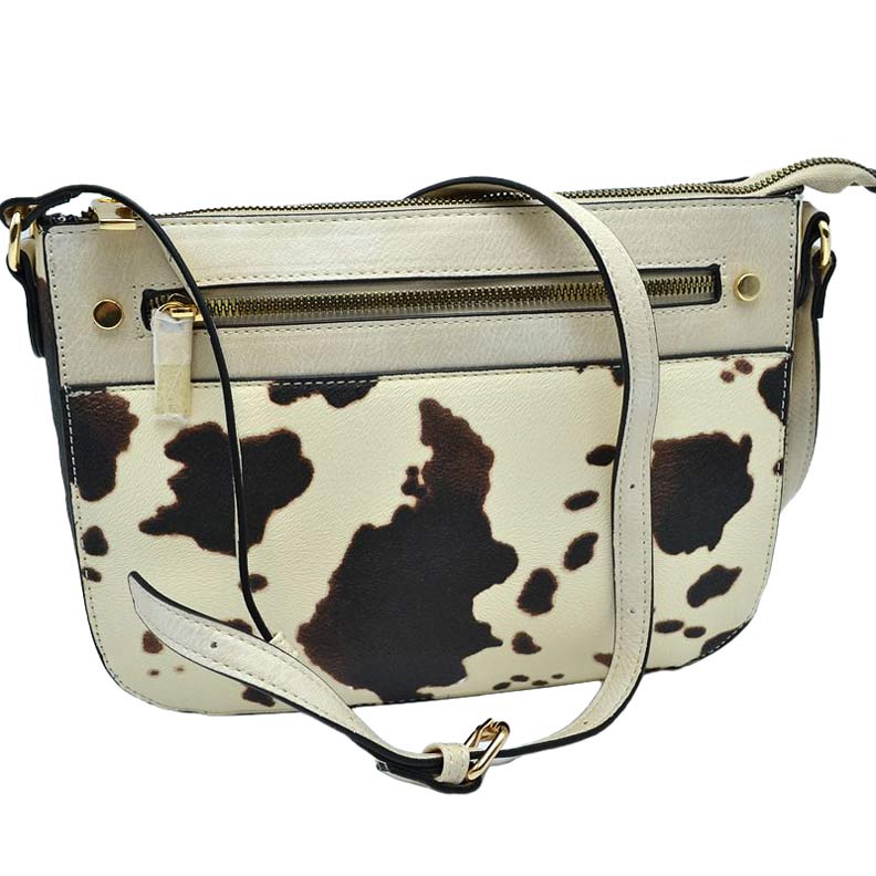 Beige Stylish Cowprint Pattern Crossbody Handbag, This Cowprint handbag can be worn crossbody or on the shoulder comfortably. This comfortable handbag is made of high-quality durable PU leather which is also beautiful at the same time. This handbag features one big compartment for your daily essentials and a little more. Show your trendy choice and smartness with this awesome cow-print bag.