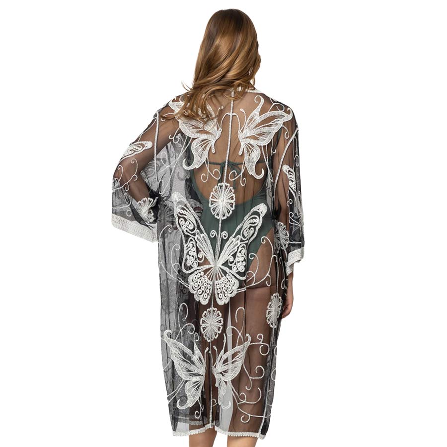 Black Butterfly Lace Cover Up Kimono Poncho, your neck deserves something better than cheap fabrics. This lightweight kimono poncho features a butterfly lace design. It's a design that gives any outfit a unique look. Can even be used as a beach bathing suit wrap. you will receive a lot of compliments on it. Excellent quality and perfect size you will absolutely love this cover-up kimono.