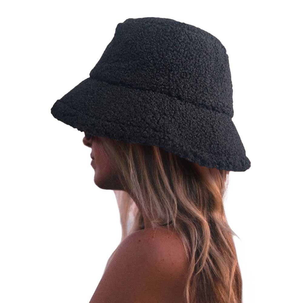 Black Fluffy Bucket Hat, Show your excellent choice with this chic Faux Fur Bucket Hat. This fluffy bucket hat is nicely designed and a great addition to your attire. Have fun and look Stylish anywhere outdoors. Great for covering up when you are having a bad hair day. Perfect for protecting you from the wind, snow, beach, pool, camping, or any outdoor activities in cold weather. Amps up your outlook with confidence with this trendy bucket hat.