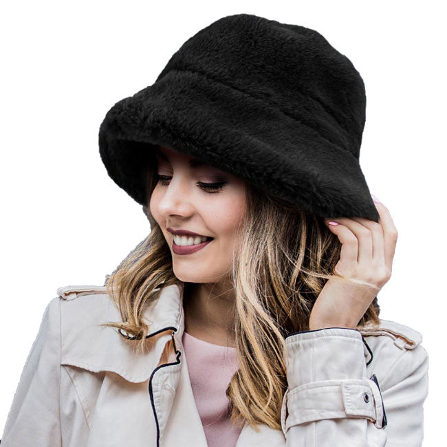 Black Polyester Faux Fur Bucket Hat, stay warm and cozy, protect yourself from the cold, this most recongizable look with remarkable bold, soft & chic bucket hat, features a rounded design with a short brim. The hat is foldable, great for daytime. Perfect Gift for cold weather!
