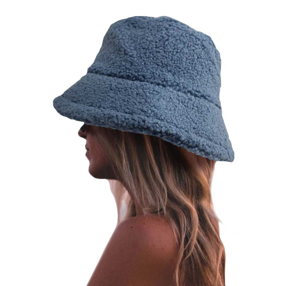 Blue Fluffy Bucket Hat, Show your excellent choice with this chic Faux Fur Bucket Hat. This fluffy bucket hat is nicely designed and a great addition to your attire. Have fun and look Stylish anywhere outdoors. Great for covering up when you are having a bad hair day. Perfect for protecting you from the wind, snow, beach, pool, camping, or any outdoor activities in cold weather. Amps up your outlook with confidence with this trendy bucket hat.