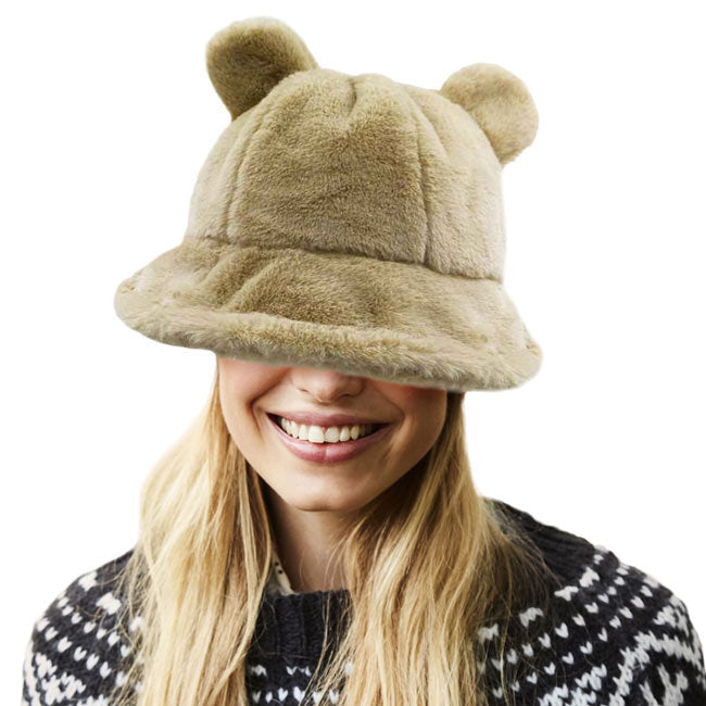 Brown Faux Fur Bear Ear Bucket Hat, Show your excellent choice with this chic Faux Fur bear Bucket Hat. This animal themed bucket hat is nicely designed and a great addition to your attire. Have fun and look Stylish anywhere outdoors. Great for covering up when you are having a bad hair day. Perfect for protecting you from the wind, snow, beach, pool, camping, or any outdoor activities in cold weather. Amps up your outlook with confidence with this trendy bucket hat.