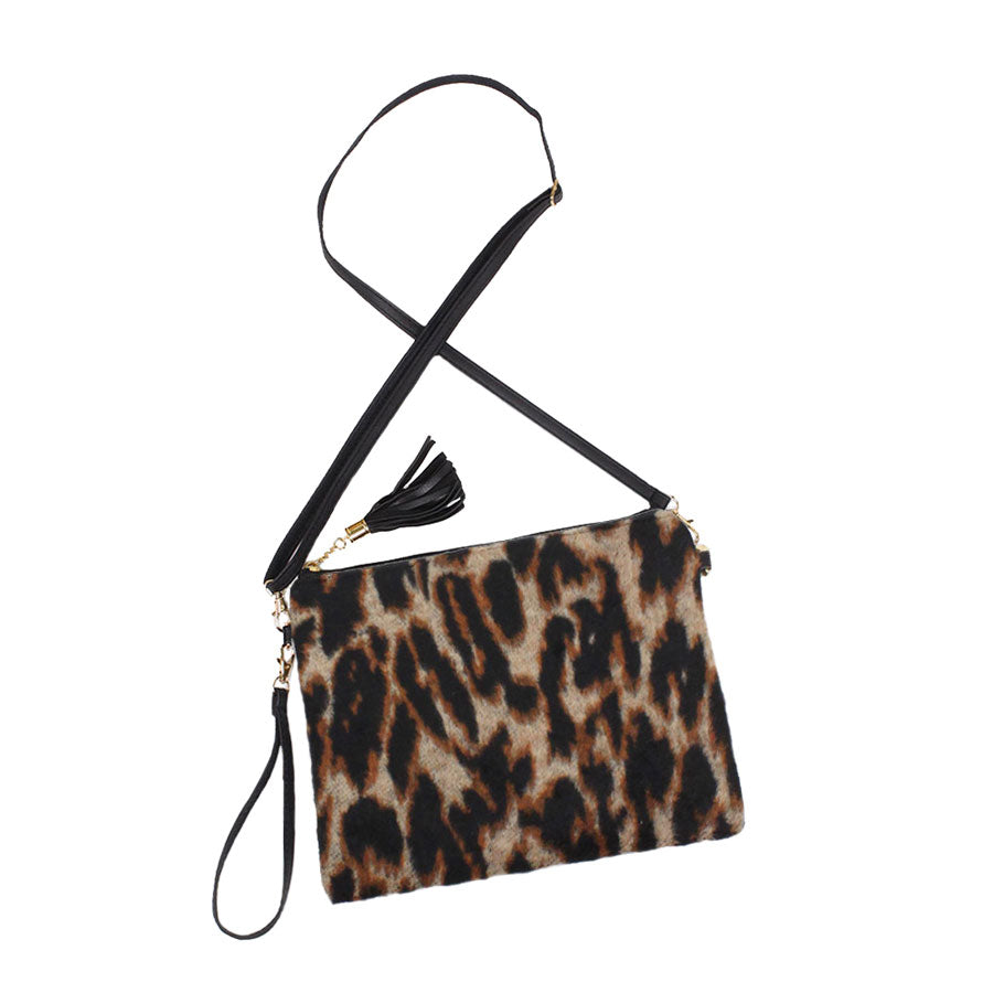 Brown Leopard Patterned Crossbody Clutch Bag. Be the ultimate fashionista carrying this trendy crossbody clutch bag! great for when you need something small to carry or drop in your bag. perfect for the festive season, embrace the animal themed spirit with these bag, these pretty gift Crossbody Bags are sure to bring a smile to your face.