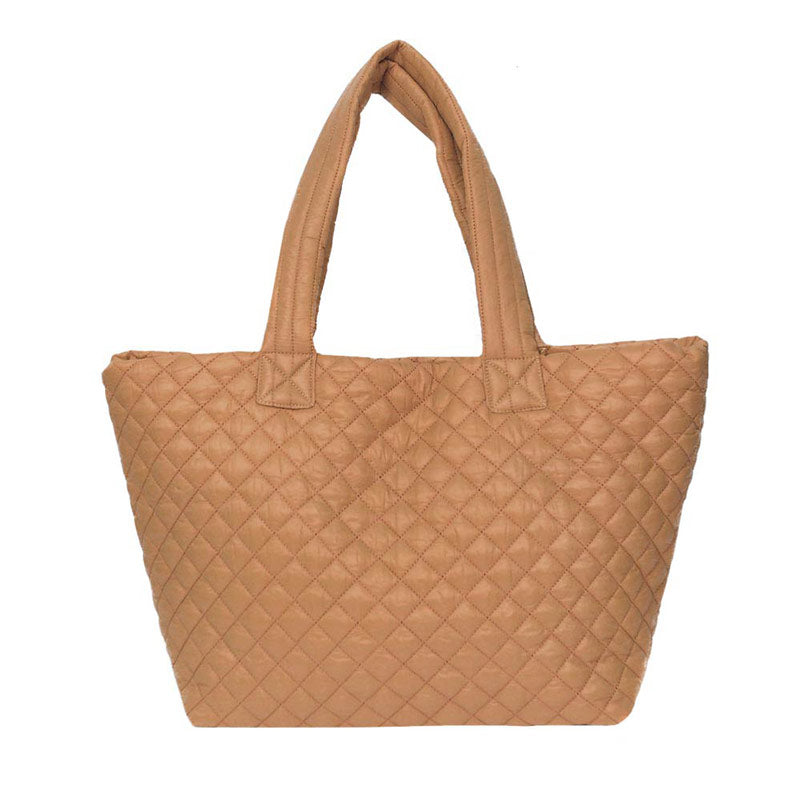Camel Quilted Padded Puffer Tote Bag, has plenty of room to carry all your handy items with ease. Trendy and beautiful bag that amps up your outlook while carrying. Great for different activities including quick getaways, holidays, Shopping, beach, or even going outdoors! This tote bag features a top zipper closure for security that makes your life easier and trendier. Its catchy and awesome appurtenance drags everyone's attraction to you.