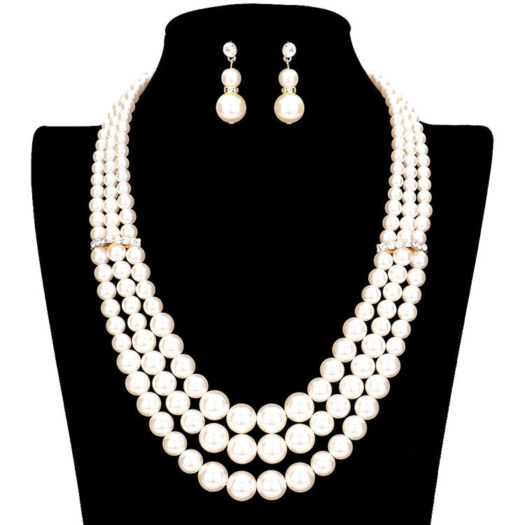 Cream Gold Triple Layer Pearl Strand Necklace, dare to dazzle with this bejeweled necklace set, designed to accent the neckline, including dangle earrings, which are a perfect way to add sparkle to everything, showing off your elegance. Wear together or separate according to your event. Perfect Gift, Birthday, Anniversary, Prom, Mother's Day Gift, Sweet 16, Wedding, Quinceanera.