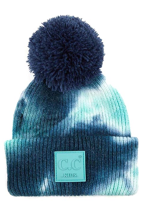 Deep Teal Sea Green C C Tie Dye Kids Beanie With C C Rubber Patch And Yarn Pom, beautiful tie dye design with yarn pom makes it unique and keeps you standing out with perfect beauty. Wear throughout the winter and cold days to ensure absolute comfortability. Coordinate with any outfit to match the best with perfect warmth and coziness. It Comes in one size winter cap with a pom that fits most head sizes. Enjoy the winter in comfort!