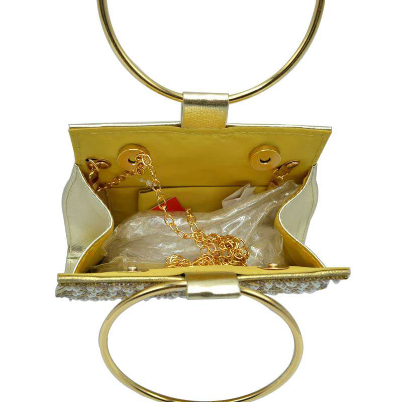 Gold Elegant Clutch Purses Bride and Bridesmaid Evening Handbag is an excellent addition to your attire to show your trendy choice for carrying on the special occasion with your handy stuff. It is perfectly lightweight and easy to move throughout the whole day. You'll look glowing and the ultimate fashionista while carrying this trendy Evening Bag.