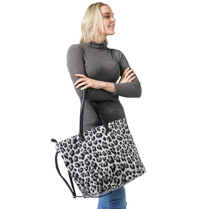 Gray Leopard Weekend Tote Bag With Pouch, comes with a cute and matching wallet. It enriches your gorgeousness and looks stylish. These Leopard themed bag Versatile enough for wearing straight through the week. perfectly lightweight to carry around all day. The best way to carry all of your necessary things altogether. Perfect Birthday Gift, Anniversary Gift, Mother's Day Gift, Graduation Gift, Valentine's Day Gift. Stay trendy with this awesome tote bag.