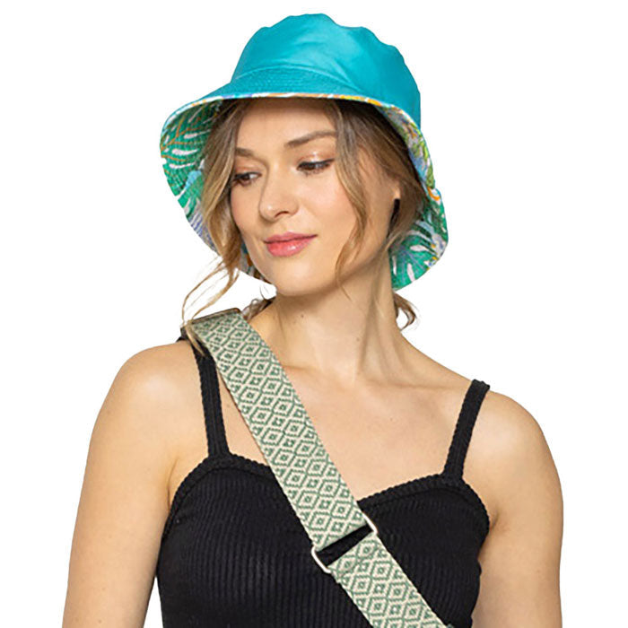 Green Tropical Leaf Printed Reversible Bucket Hat, whether you’re basking under the summer sun at the beach, lounging by the pool, or kicking back with friends at the lake, a great hat can keep you cool and comfortable even when the sun is high in the sky. Large, comfortable, and perfect for keeping the sun off of your face.