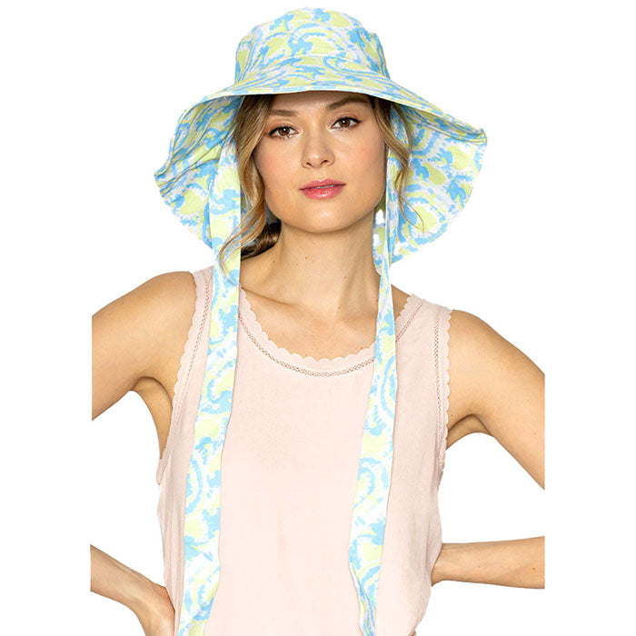 Green Watercolored Chin Tie Bucket Hat. Show your trendy side with this chin Tie bucket hat. Have fun and look Stylish. Great for covering up when you are having a bad hair day and still looking cool. Perfect for protecting you from the sun, rain, wind, snow, beach, pool, camping or any outdoor activities.