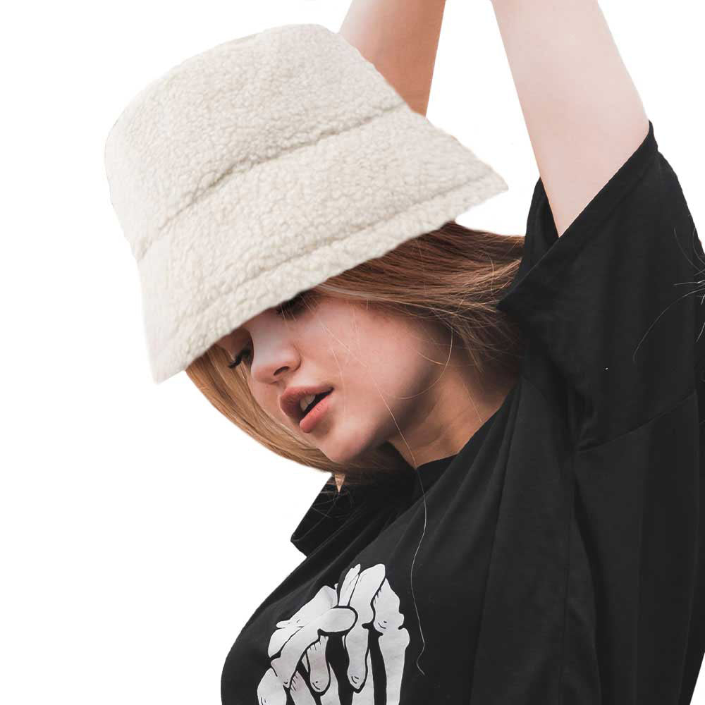 Ivory Fluffy Bucket Hat, Show your excellent choice with this chic Faux Fur Bucket Hat. This fluffy bucket hat is nicely designed and a great addition to your attire. Have fun and look Stylish anywhere outdoors. Great for covering up when you are having a bad hair day. Perfect for protecting you from the wind, snow, beach, pool, camping, or any outdoor activities in cold weather. Amps up your outlook with confidence with this trendy bucket hat.