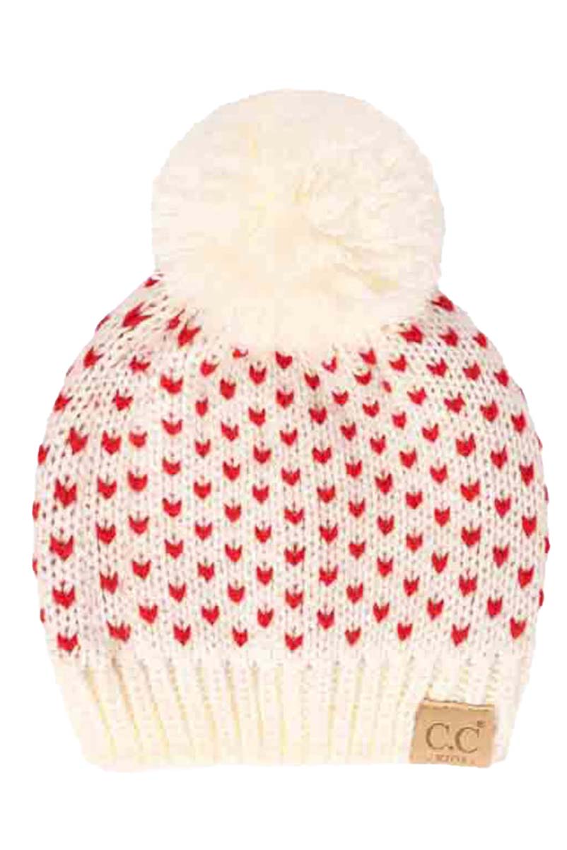 Ivory Red C C Kids Heart Pattern Knit Beanie with Pom, awesome heart pattern design with yarn pom makes it beautiful and keeps your kids standing out with perfect beauty. Wear throughout the winter and cold days to ensure absolute comfortability. Coordinate with any outfit to match the best with perfect warmth and coziness. It Comes in one size winter cap with a pom that fits most head sizes. Enjoy the winter in comfort with this Heart Beanie!