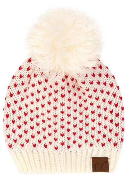 Ivory Red C.C Heart Pattern Knit Pom Beanie Hat, before running out the door into the cool air, you’ll want to reach for this toasty beanie to keep you incredibly warm. Accessorize the fun way with this faux fur pom pom hat, it's the autumnal touch you need to finish your outfit in style. Awesome winter gift accessory! Perfect Gift Birthday, Christmas, Stocking Stuffer, Secret Santa, Holiday, Anniversary, Valentine's Day, Loved One.